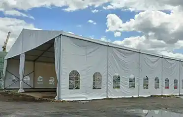 Are small and medium-sized factories suffering significant losses due to rust and moisture damage on goods stored outdoors? Could manual retractable tents offer a cost-effective solution for rain protection and rust prevention?